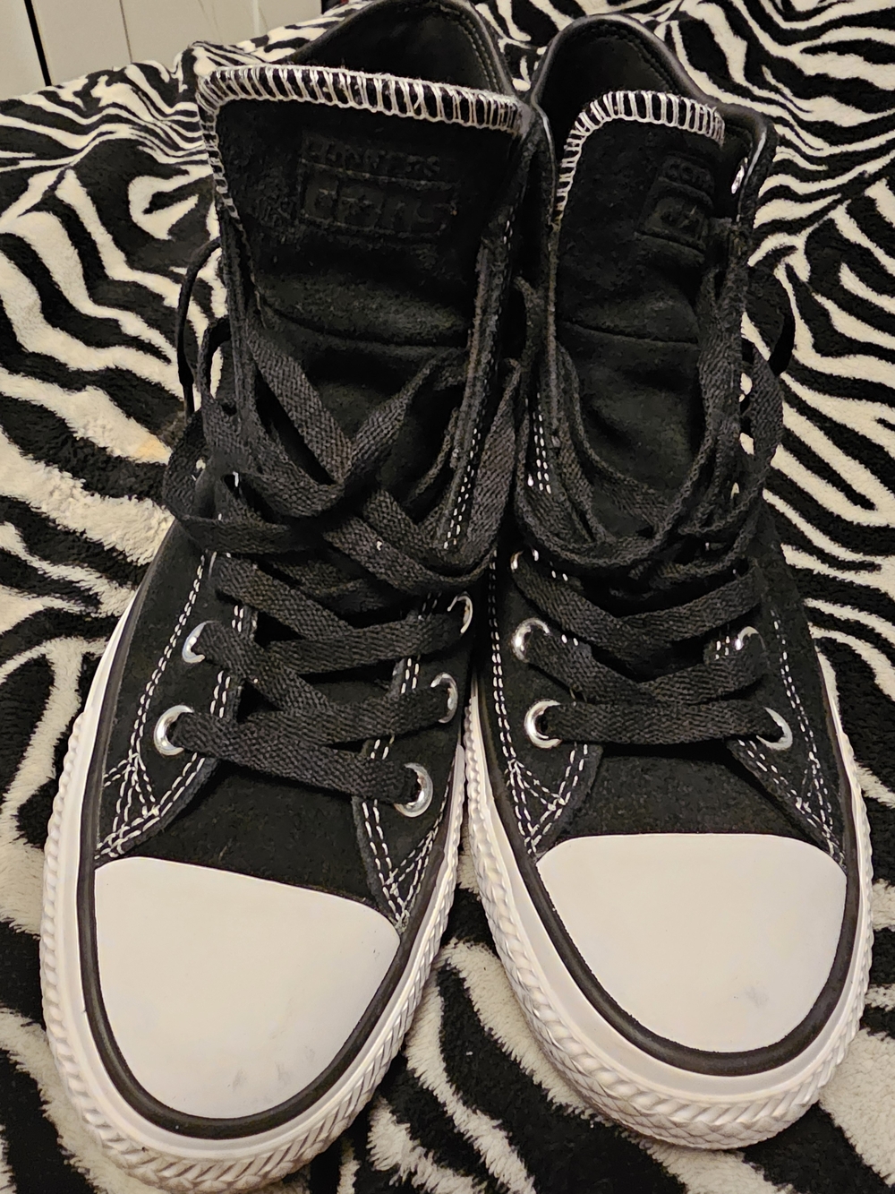 Converse Black and White High-Top Sneakers